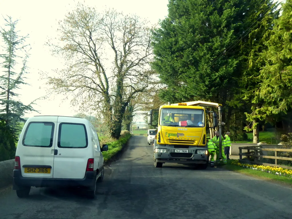 Emptying a road gully along Ballynahatty Road